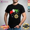 The Grinch Hand Holding Ornament New Orleans Saints Christmas Shirt - Design By Teeshirtcat.com