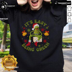 Cozy Christmas sweatshirt featuring Kermit the Frog with 'It's Easy Being Green' slogan, perfect for holiday cheer.