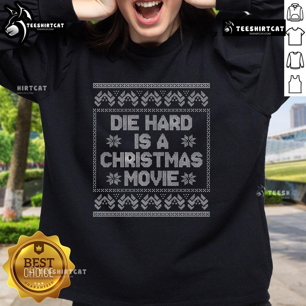 Alt Text: Cozy 'Nice Die Hard Is A Christmas Movie' sweatshirt in festive colors, perfect for holiday movie fans.