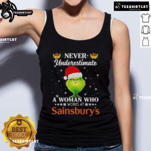 Funny Christmas tank top featuring the Grinch and the slogan 'Never underestimate a woman who works at Sainsbury's.'
