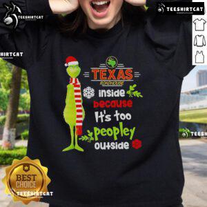 Cozy Christmas sweatshirt featuring a Nice Grinch design, perfect for indoor gatherings at Texas Roadhouse during the holidays.