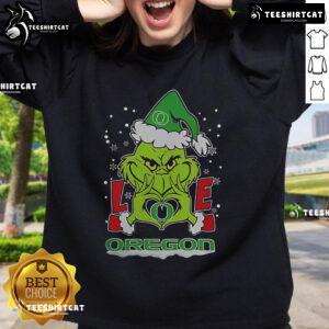 2024 Oregon Ducks Football Christmas sweatshirt featuring Nice-The-Grinch with a love heart design for holiday cheer.