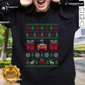 Cute Rottweiler wearing a Santa hat on a Nice Ugly Christmas sweatshirt for dog lovers and holiday cheer.