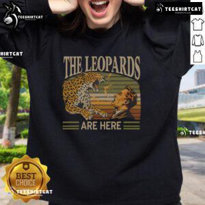 Nice Vintage The Leopards Are Here Meme Sweatshirt featuring a playful leopard graphic on a cozy fabric.