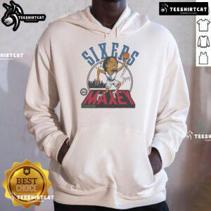 Alt Text: Official 76ers Tyrese Maxey signature hoodie featuring team colors and logo, perfect for fans and basketball enthusiasts.