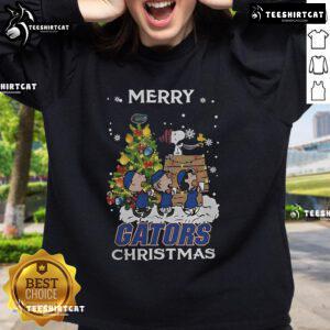 Florida Gators X Snoopy and Friends Merry Christmas 2024 Sweatshirt featuring festive designs and team colors.