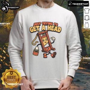 Funny guillotine sweatshirt design featuring a humorous play on words about 'just trying to get a head'.