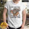 Funny 'I Dont Need Tools, I Am The Tool' Prehistoric Man T-Shirt showcasing a humorous graphic design for casual wear.