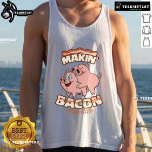Funny 'Makin' Bacon' pig tank top featuring a zany metallic star ornament for meatatarians and humor lovers.