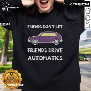 Driving enthusiast wearing a 'Good Manual Transmission Car' sweatshirt, showcasing passion for manual cars and driving culture.