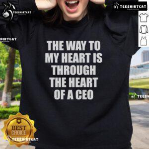 Stylish 'Good The Way To My Heart Is Through The Heart Of A CEO' sweatshirt in a cozy setting, perfect for casual wear.