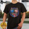 Happy Pitbull dog dad and mom wearing American flag t-shirt, showcasing love for Pit Bull dogs and patriotism.