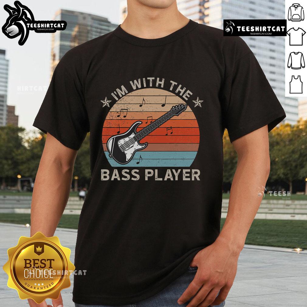 Alt Text: Nice I'm With The Bass Player T-Shirt featuring a guitarist silhouette against a sunset, perfect for music lovers.