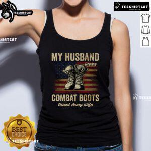 Army wife proudly wearing a 'My Husband Wears Combat Boots' tank top, showcasing support for her military spouse.