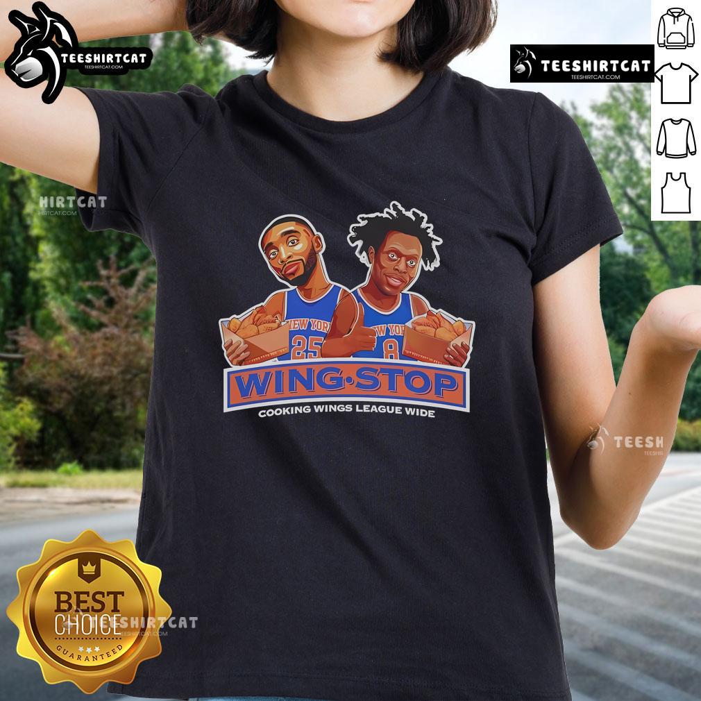 NY Knicks Wing Stop cooking wings: stylish ladies tee showcasing team spirit and flavor in vibrant colors.