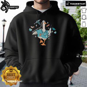 Registered Nurse wearing a 'Silly Goose' hoodie, showcasing fun nursing school spirit for aspiring RNs.