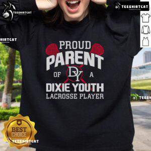 Proud parent wearing a 'Nice Proud Parent of a Dixie Youth Lacrosse Player' sweatshirt at a youth lacrosse game.