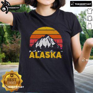 Vintage Alaskan ladies tee featuring a retro Alaska mountain design, perfect for outdoor enthusiasts and fashion lovers.