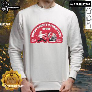 Official Bobby Knight's Furniture sweatshirt featuring 'Buy a Sofa, I Will Throw in a Chair' slogan in bold lettering.