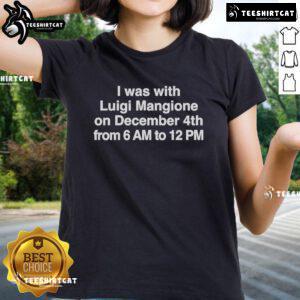 Alt Text: Official Ladies Tee featuring Luigi Mangione, December 4th event, from 6 AM to 12 PM, showcasing vibrant design.