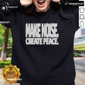 Official Make Noise Create Peace Sweatshirt featuring a bold graphic design, perfect for promoting peace and creativity.