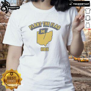 Alt Text: Official Michigan Football Plant The Flag 2024 Ladies Tee showcasing team spirit and style for female fans.