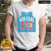 Official Mom Jeans 420 Jersey T-Shirt displayed on a hanger, featuring a trendy design and comfortable fabric for casual wear.