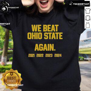 2024 Official Swanky Wolverine We Beat Ohio State Again Sweatshirt, showcasing team pride and vibrant colors.