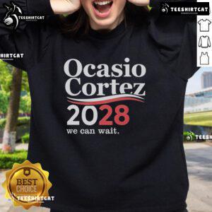 Official We Can Wait Ocasio Cortez 2028 Sweatshirt featuring bold lettering and a stylish design for supporters.