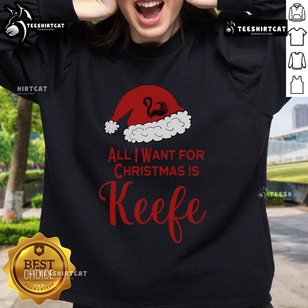 Alt Text: Cozy Pretty Christmas sweatshirt for Keeper fans of the Lost Cities, featuring festive designs and vibrant colors.