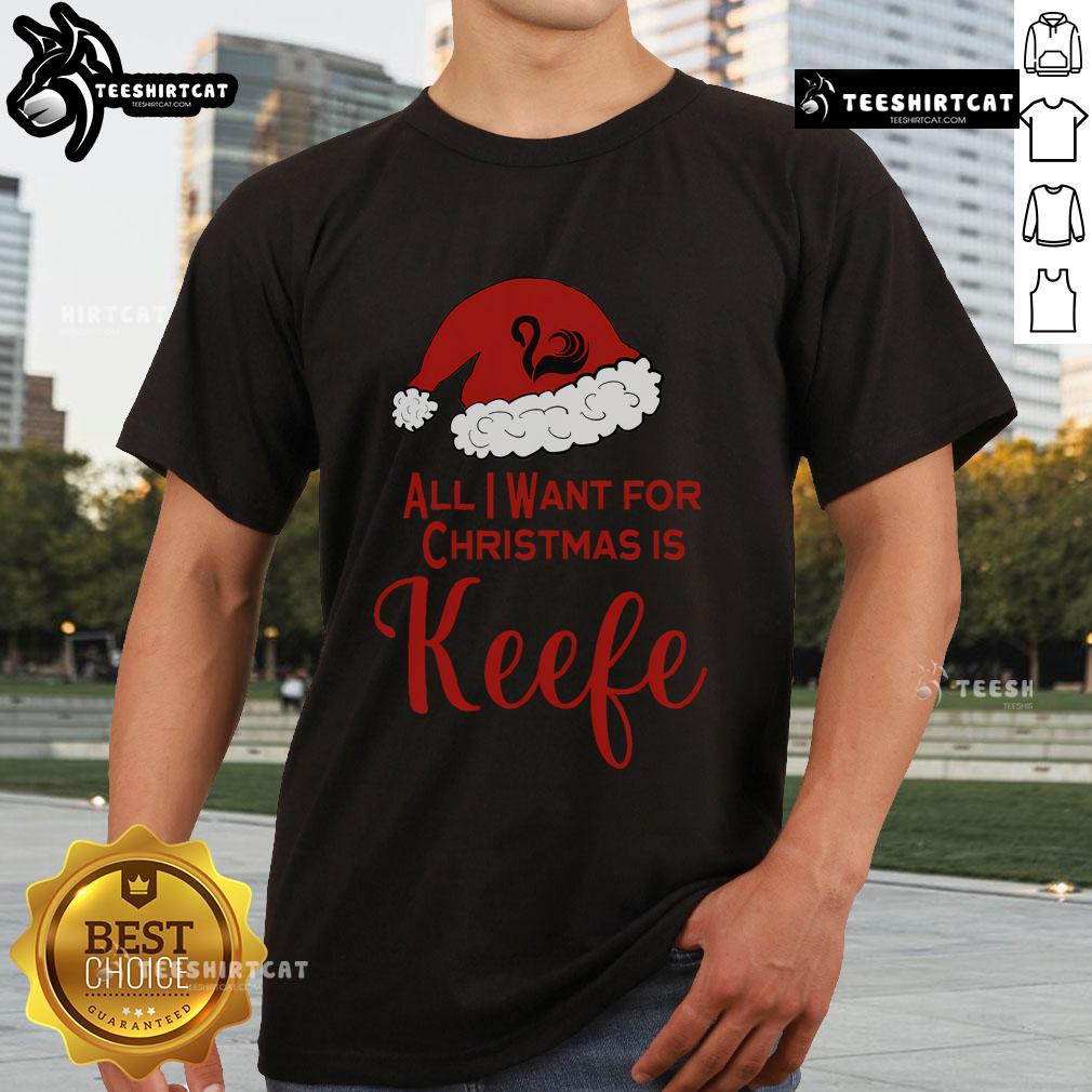 Pretty Christmas Keefe T-Shirt for Keeper fans of the Lost Cities featuring festive designs and vibrant colors.