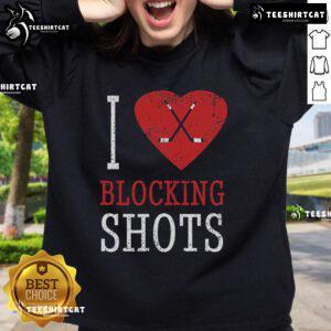Alt Text: Top I Love Blocking Shots Hockey Player Sweatshirt featuring a graphic design of a hockey player in action.