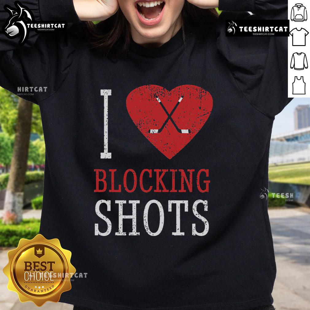 Alt Text: Top I Love Blocking Shots Hockey Player Sweatshirt featuring a graphic design of a hockey player in action.