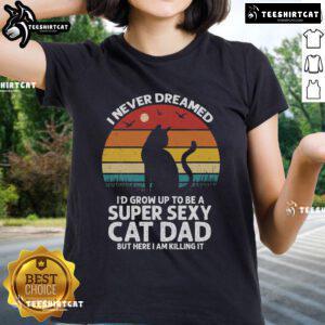 Vintage sunset graphic tee featuring the phrase 'Top I Never Dreamed I'd Grow Up To Be A Super Sexy Cat Dad.'