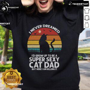 Alt Text: Vintage sunset sweatshirt with 'I Never Dreamed I'd Grow Up To Be A Super Sexy Cat Dad' design.