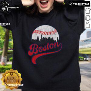 Retro skyline of Boston on a cozy baseball sweatshirt, perfect for fans looking to showcase their love for the city.