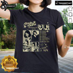 Official Gracie Abrams album 'The Secrets of Us' featured on a stylish ladies tee shirt design.