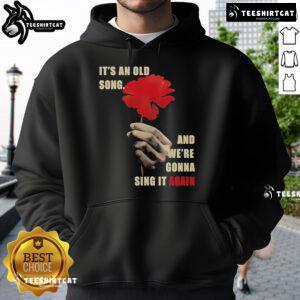 Hadestown Old Song hoodie featuring the phrase 'It's an old song and we're gonna sing it again' in stylish design.