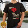 Official Hadestown 'It's An Old Song And We're Gonna Sing It Again' T-Shirt featuring vibrant design and lyrics.