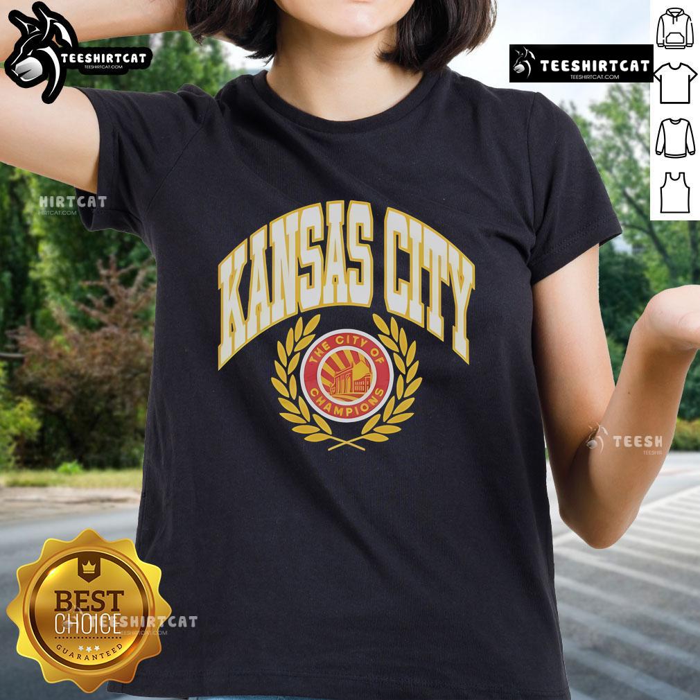 Alt Text: Official Kansas City seal on a ladies tee celebrating KC football as the City of Champions.