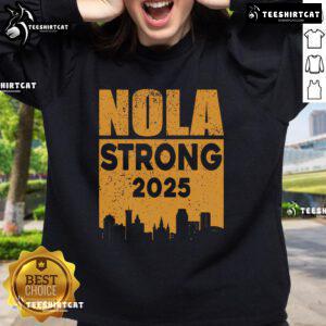 Official Nola Strong 2025 Never Forget New Orleans sweatshirt showcasing a vibrant design celebrating resilience and unity.