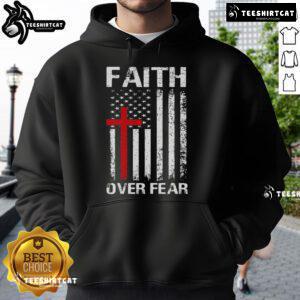 Top Christian hoodie featuring USA flag, cross design, and 'Faith Over Fear' message for American believers.