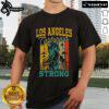 Top Los Angeles California Strong 'Pray For California' retro t-shirt design featuring bold text and vibrant colors.
