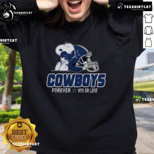 Cozy sweatshirt featuring Snoopy from The Peanuts Movie, celebrating NFL football with a Dallas Cowboys design.