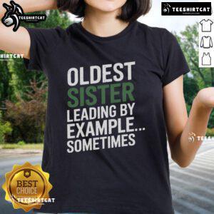 Top Oldest Sister Leading By Example Ladies Tee showcasing a stylish design perfect for proud sisters.