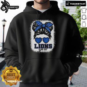 Girl in a messy bun wearing a Top Retro Lions hoodie, showcasing a stylish, casual look for fans of retro fashion.
