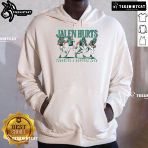 Jalen Hurts throwing football in an Awesome Jalen Hurts Throwing and Running Club hoodie, showcasing athletic style.
