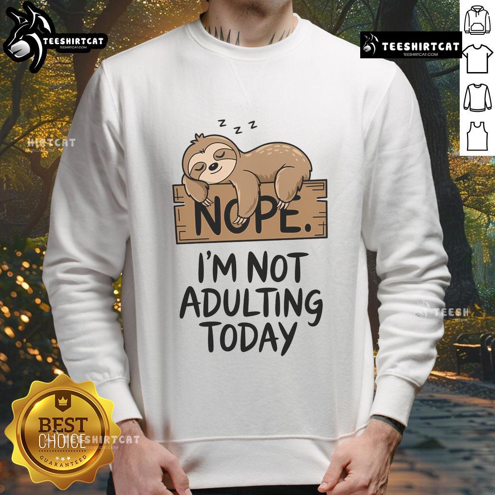 Alt Text: Cute sloth graphic on a comfy sweatshirt, perfect for lounging with the phrase Nope, I'm not adulting today.