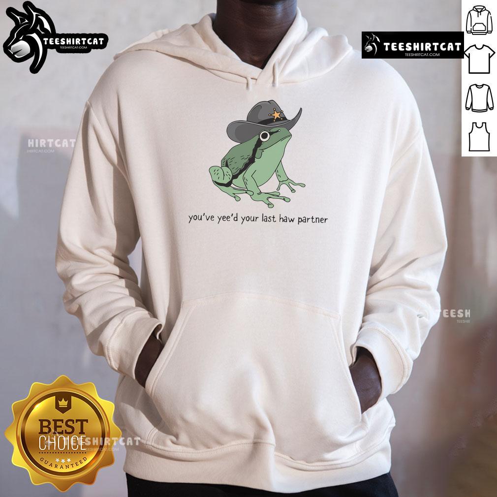 Adorable Western cowboy frog wearing 'You've Just Yeed Your Last Haw Partner' hoodie, perfect for quirky fashion lovers.