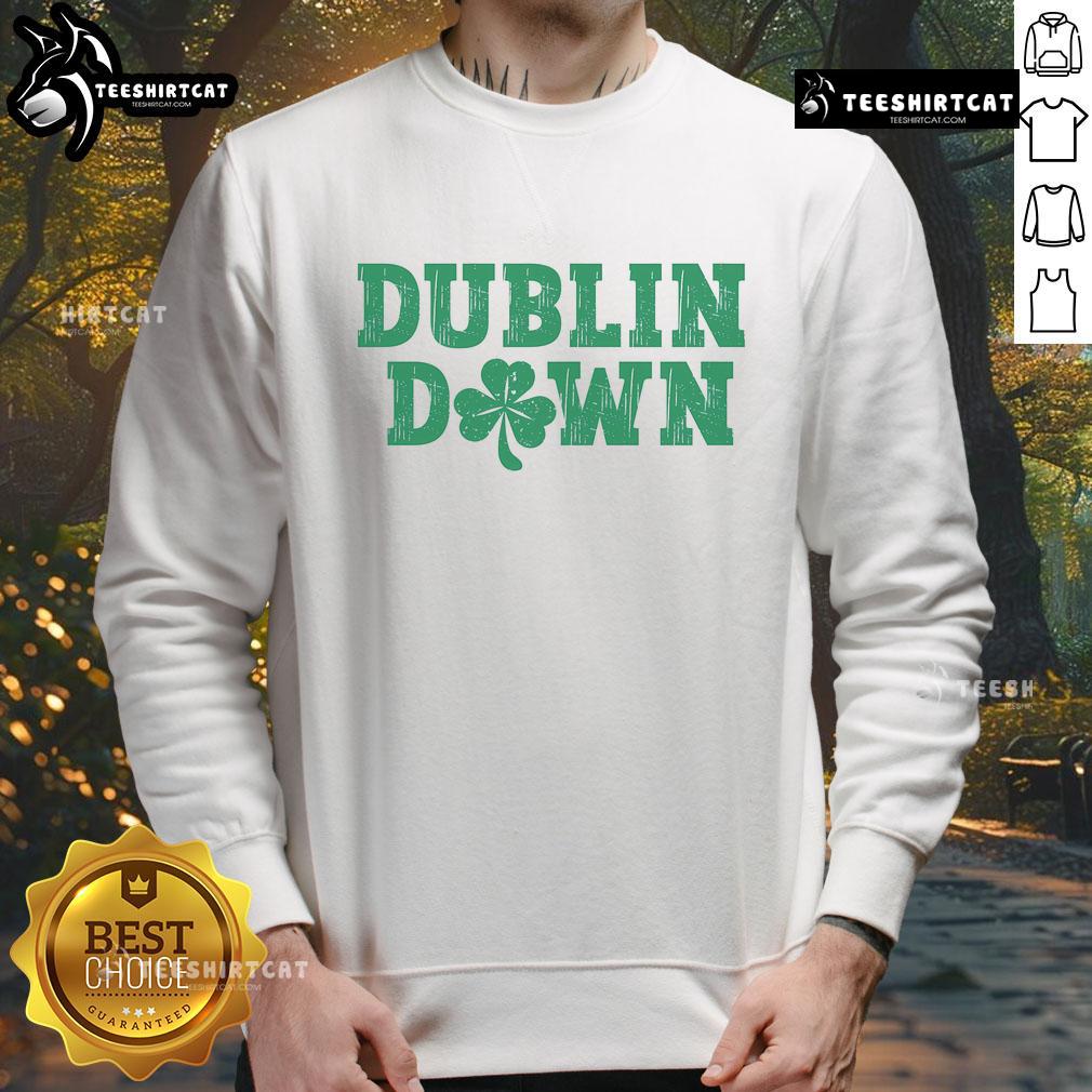 Funny Dublin Down St. Patrick's Day sweatshirt featuring playful graphic design and vibrant green color for festive celebrations.